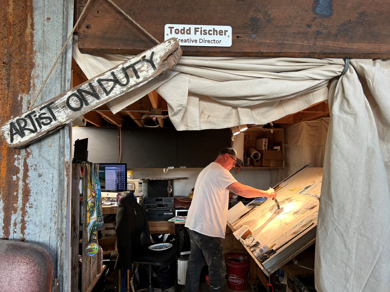 Todd Fischer painting in his studio, Artist on Duty
